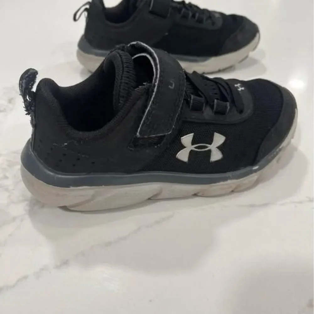 12K Shoes Sneakers black silver some wear toddler Under Armour tennis shoes